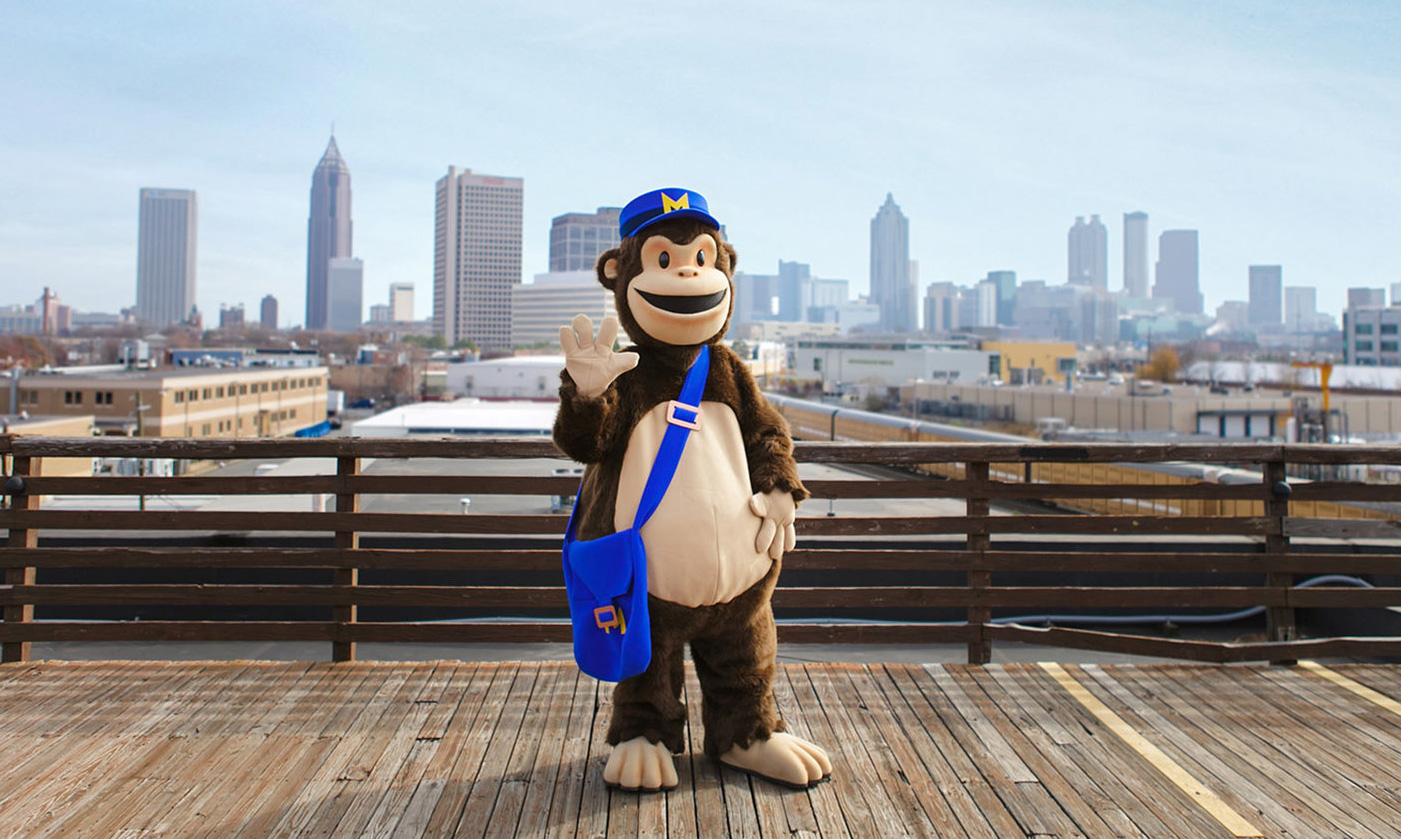 MailChimp's Freddie waving at the camera